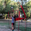 Station de filet d'entraînement de volley-ball 8 pieds de large par 11 pieds de haut Retour de balle Idéal pour frapper et servir des exercices Parfait pour l'entraînement en équipe ou en solo Installation en trois minutes Cadre de style arc